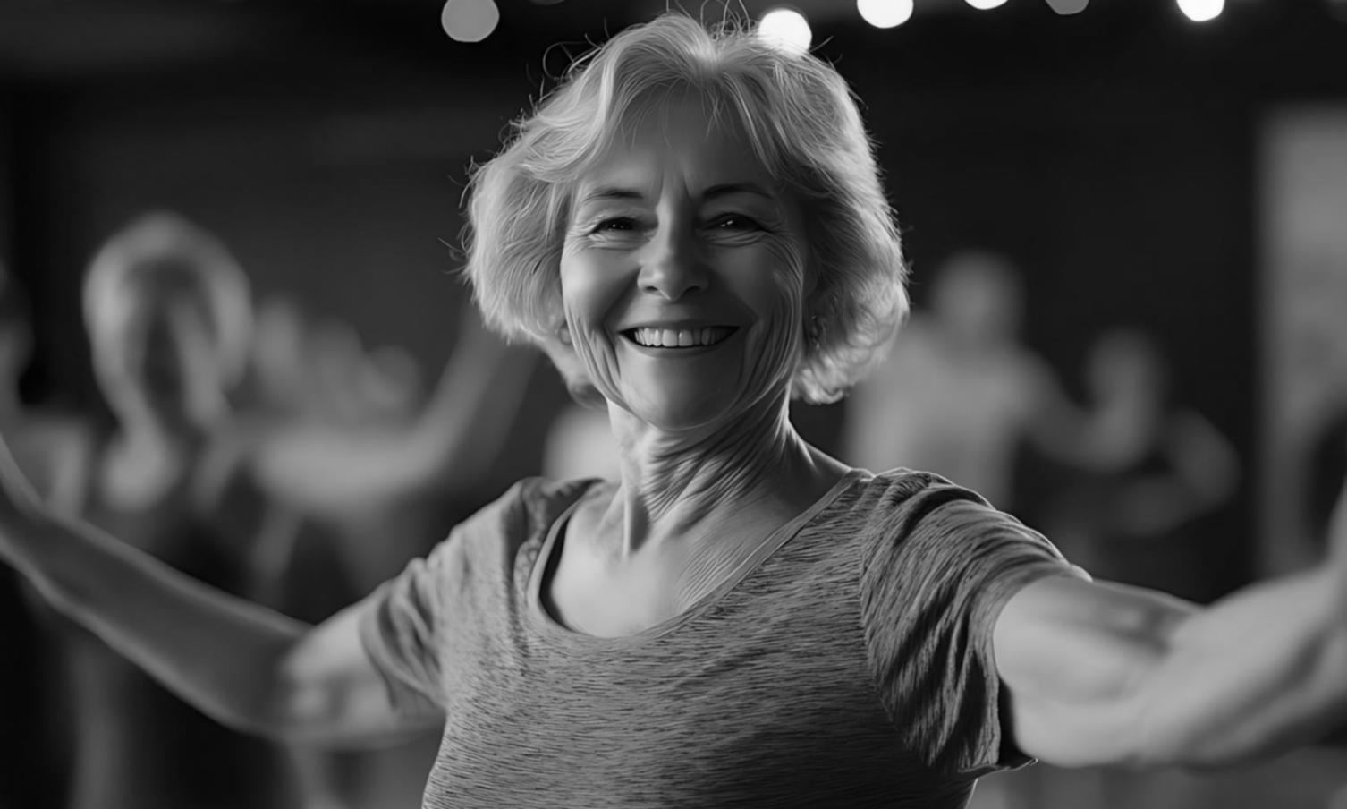 Rehabilitation specialist guiding patient through movement assessment in modern clinical environment