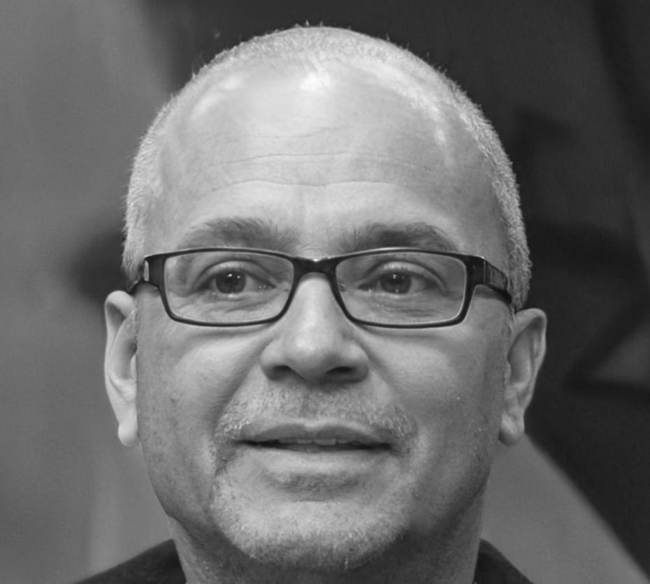 Rehabilitation program director reviewing biomechanical assessment data